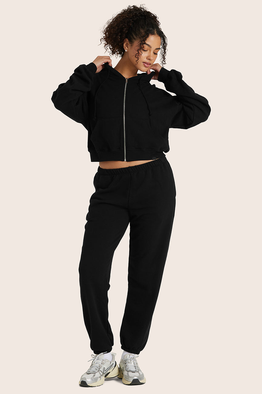 MODEL WEARS SET™ LIGHTWEIGHT SWEATS CLASSIC ZIP HOODIE IN ONYX