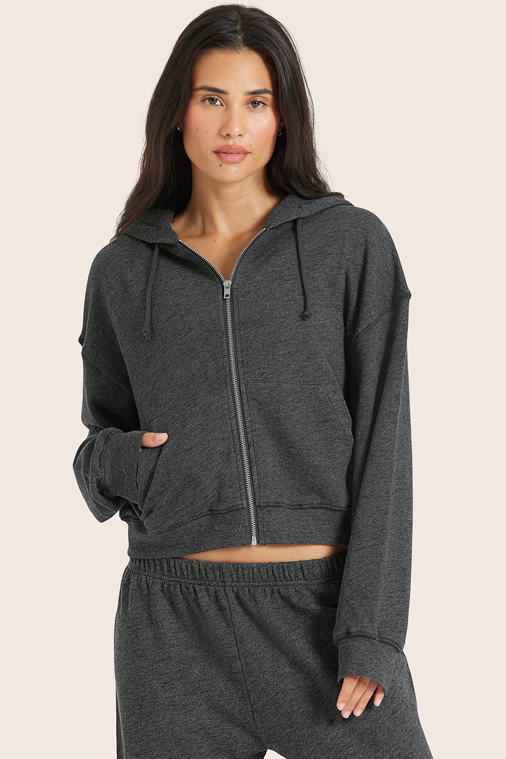 MODEL WEARS LIGHTWEIGHT SWEATS CLASSIC ZIP HOODIE IN PEPPER HEATHER GREY