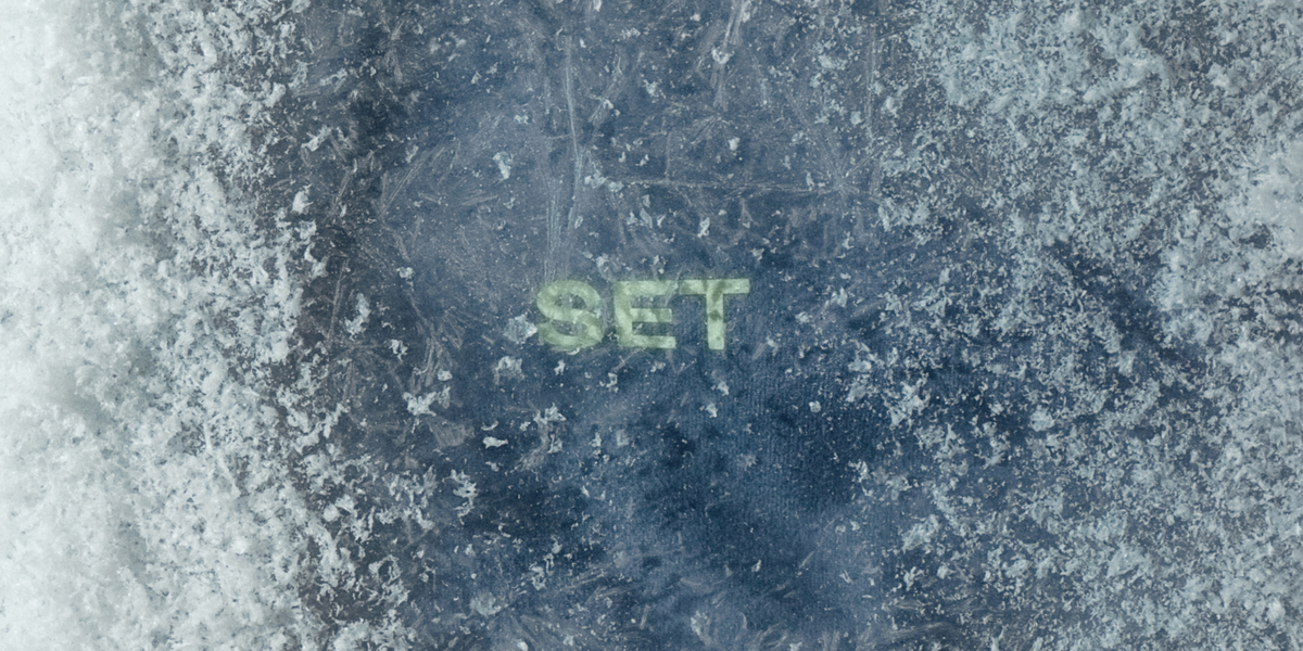 Text 'SET' on a textured blue background