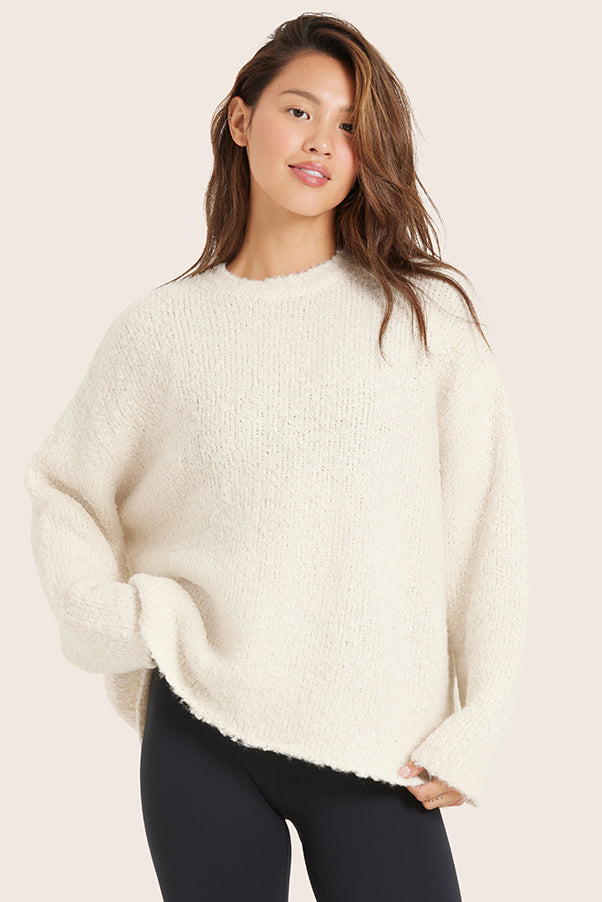 MODEL WEARS BOUCLÉ OVERSIZED CREWNECK SWEATER IN OPAL