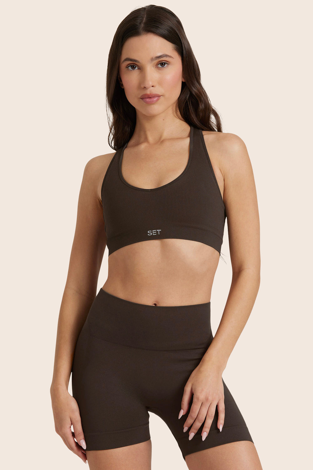 MODEL WEARS SCULPTFLEX® POWER RACER BRA IN ESPRESSO