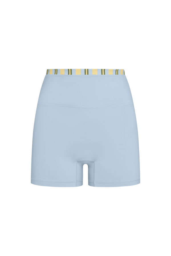 Light blue shorts with a striped waistband on a white background