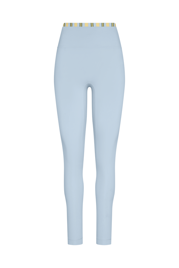 Light blue leggings with a yellow and blue striped waistband on a white background