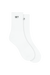 White socks with green 'SET' branding on a white background