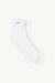 White socks with green text on a white background