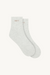 Two pairs of light gray socks with 'SET' branding on a white background