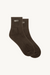 Two brown socks with 'SET' branding on a white background