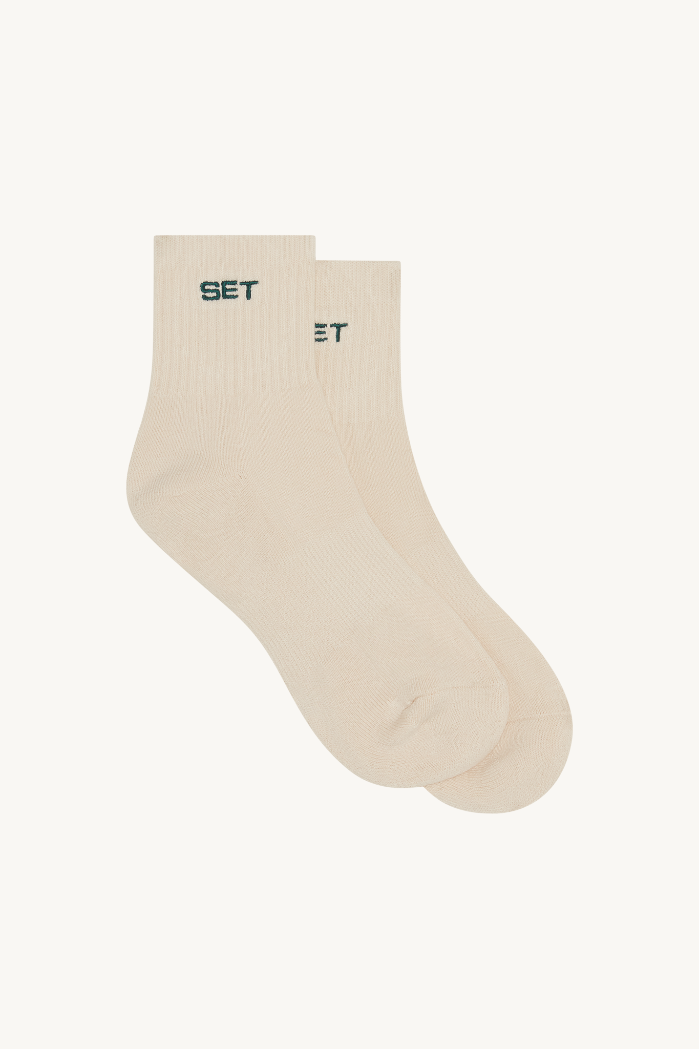 Beige ankle socks with green 'SET' brand logo