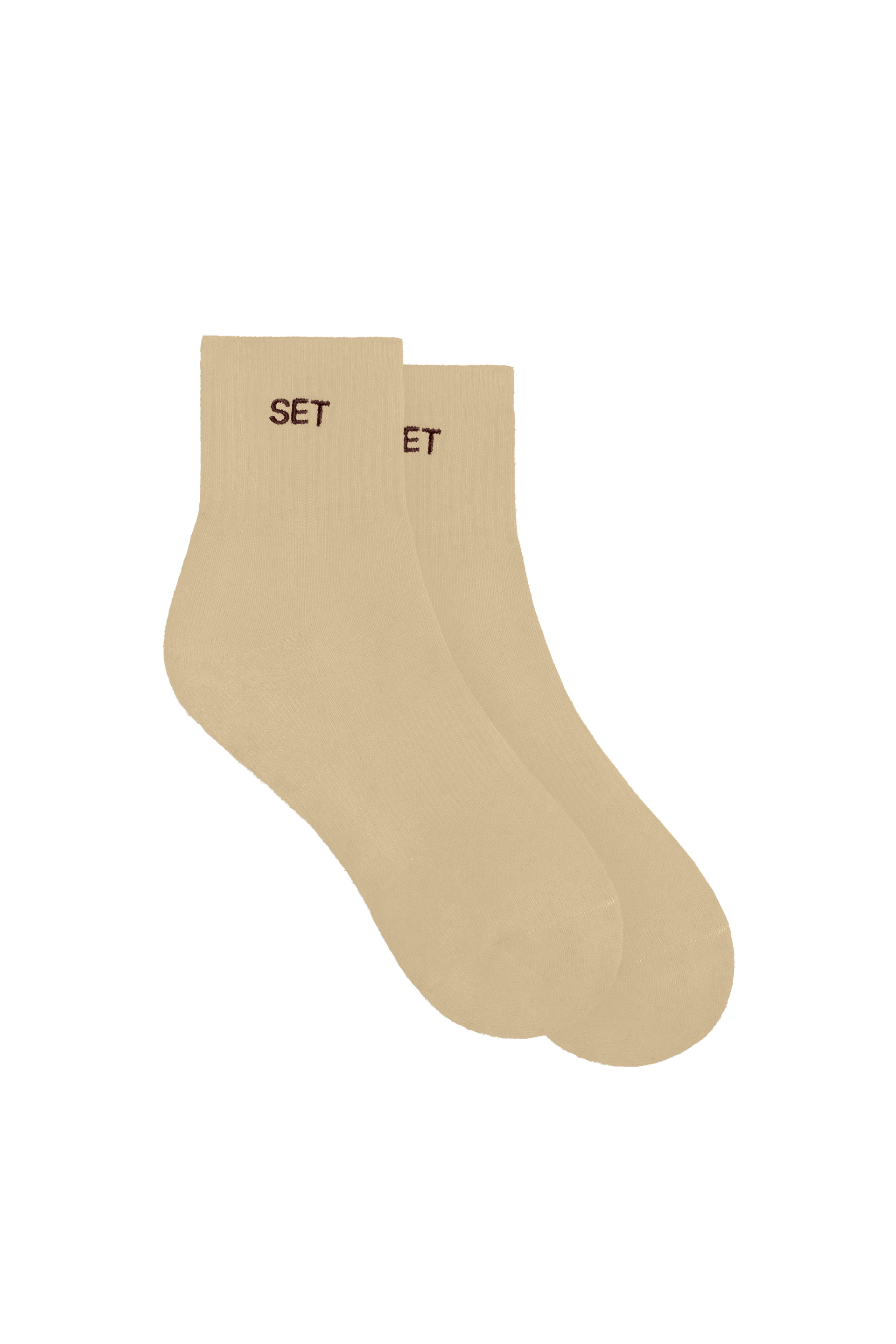 Beige socks with 'SET' text on a white background