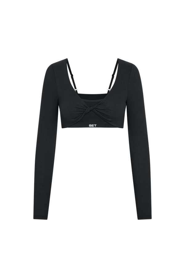 A black long-sleeve crop top with a square neckline, a twisted front detail, and thin shoulder straps, shown on a plain white background.