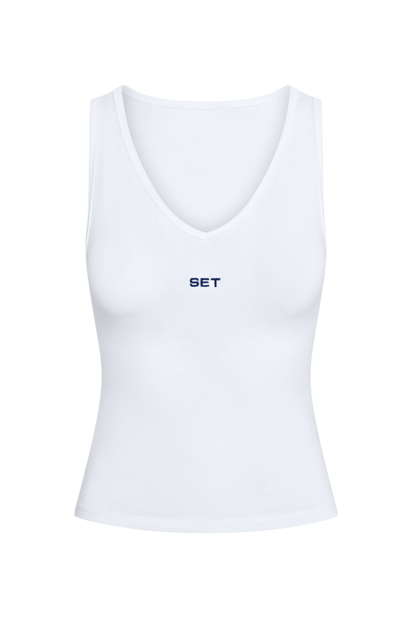 White tank top with 'SET' logo on a white background