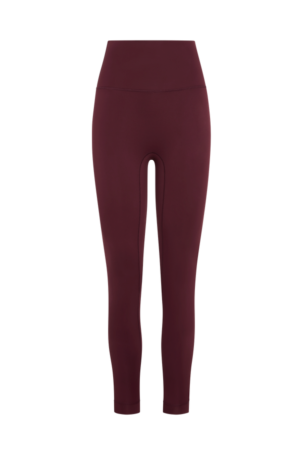 Maroon leggings on a white background