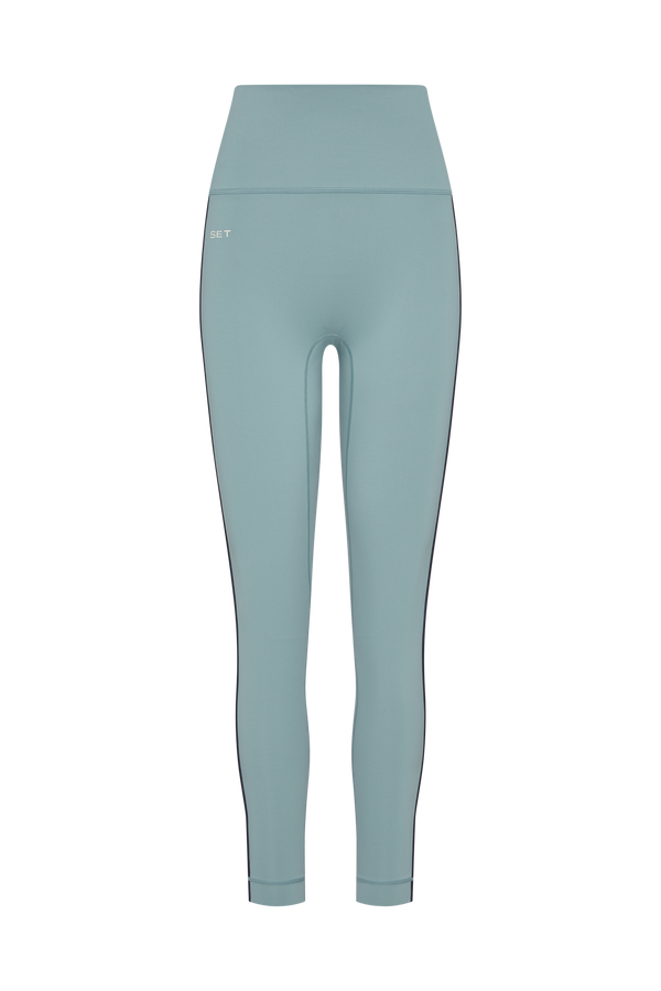 Light blue leggings on a white background