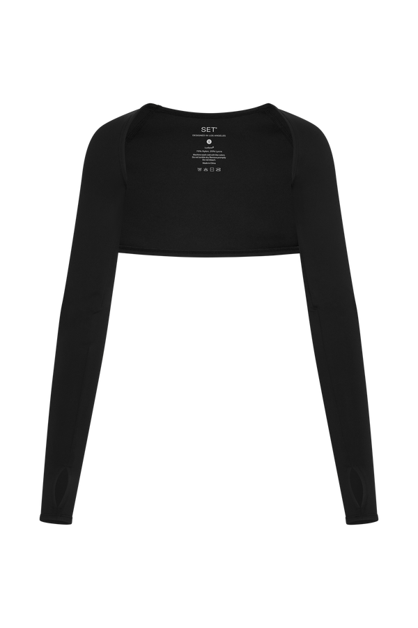 Black long-sleeve crop top on a white background
