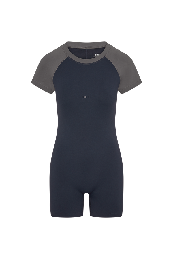 Black and navy one piece on a white background