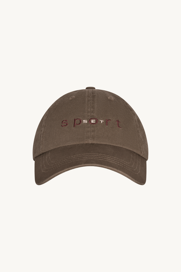 Brown cap with 'sport' text on a white background