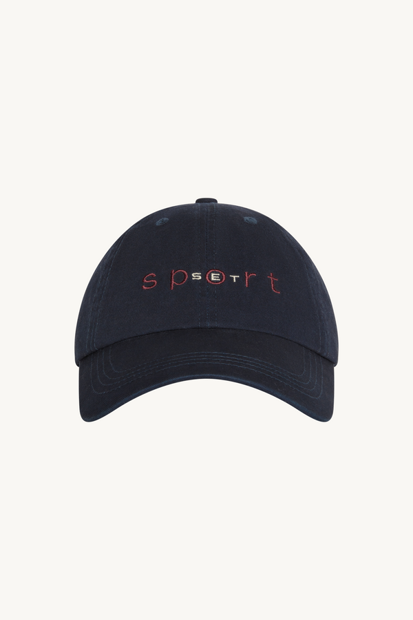 Navy blue cap with 'sport' text on a white background