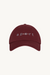 Maroon cap with 'sport' text on a white background