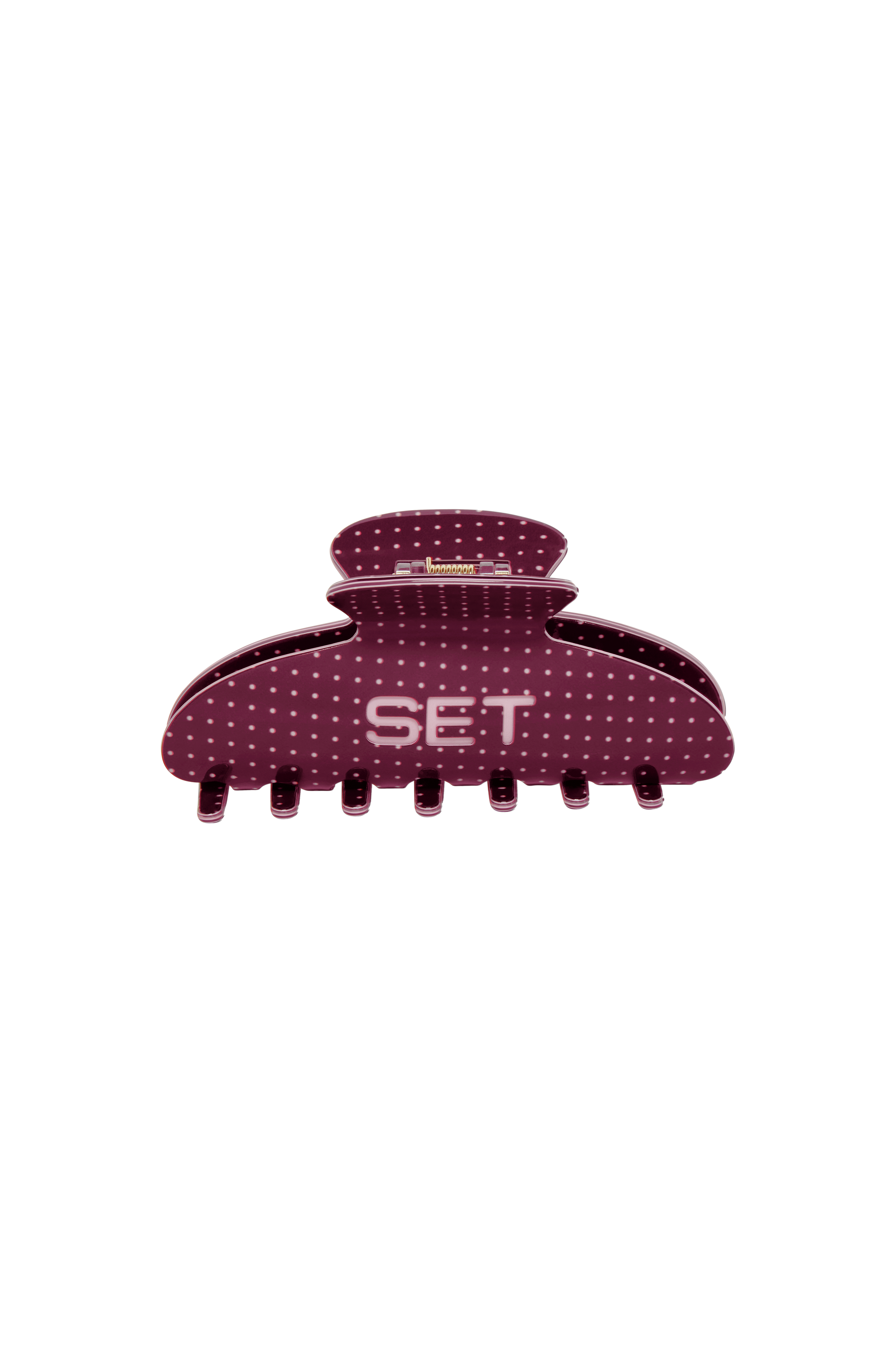 mauve colored hair clip with light pink polka dots and engraved 'SET' logo on a white background.
