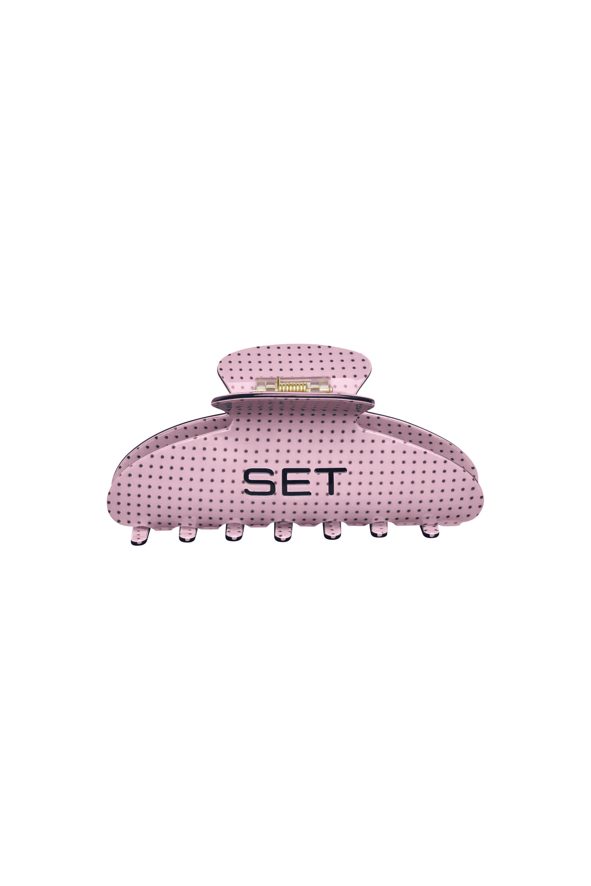 Pink with brown polka dots hair clip with 'SET' branding on a white background