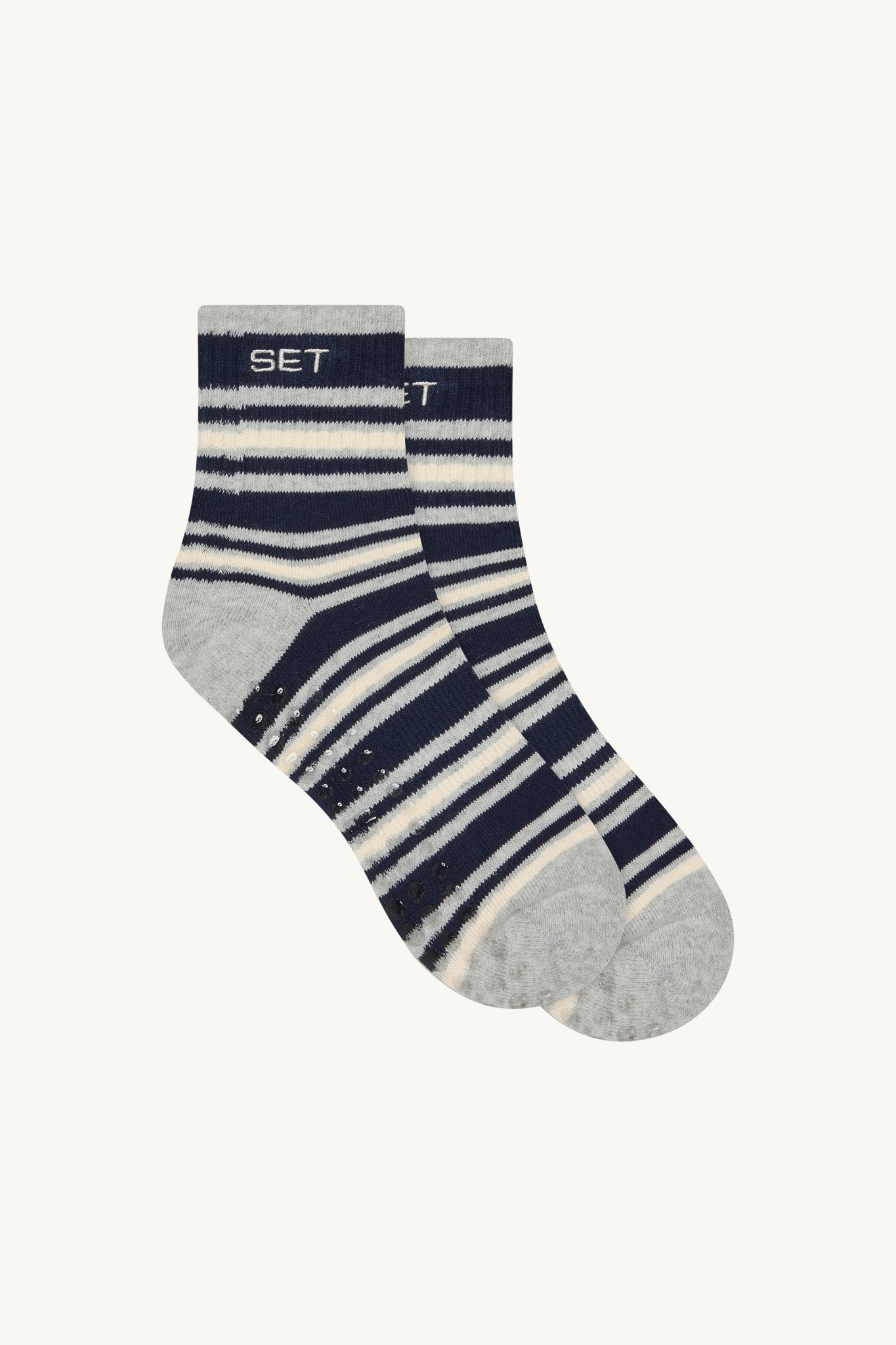 Pair of socks with a striped pattern on a white background