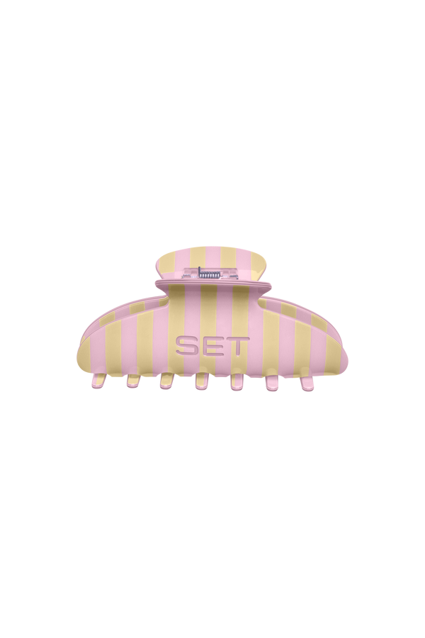 Pink and yellow striped hair clip with 'SET' branding on a white background