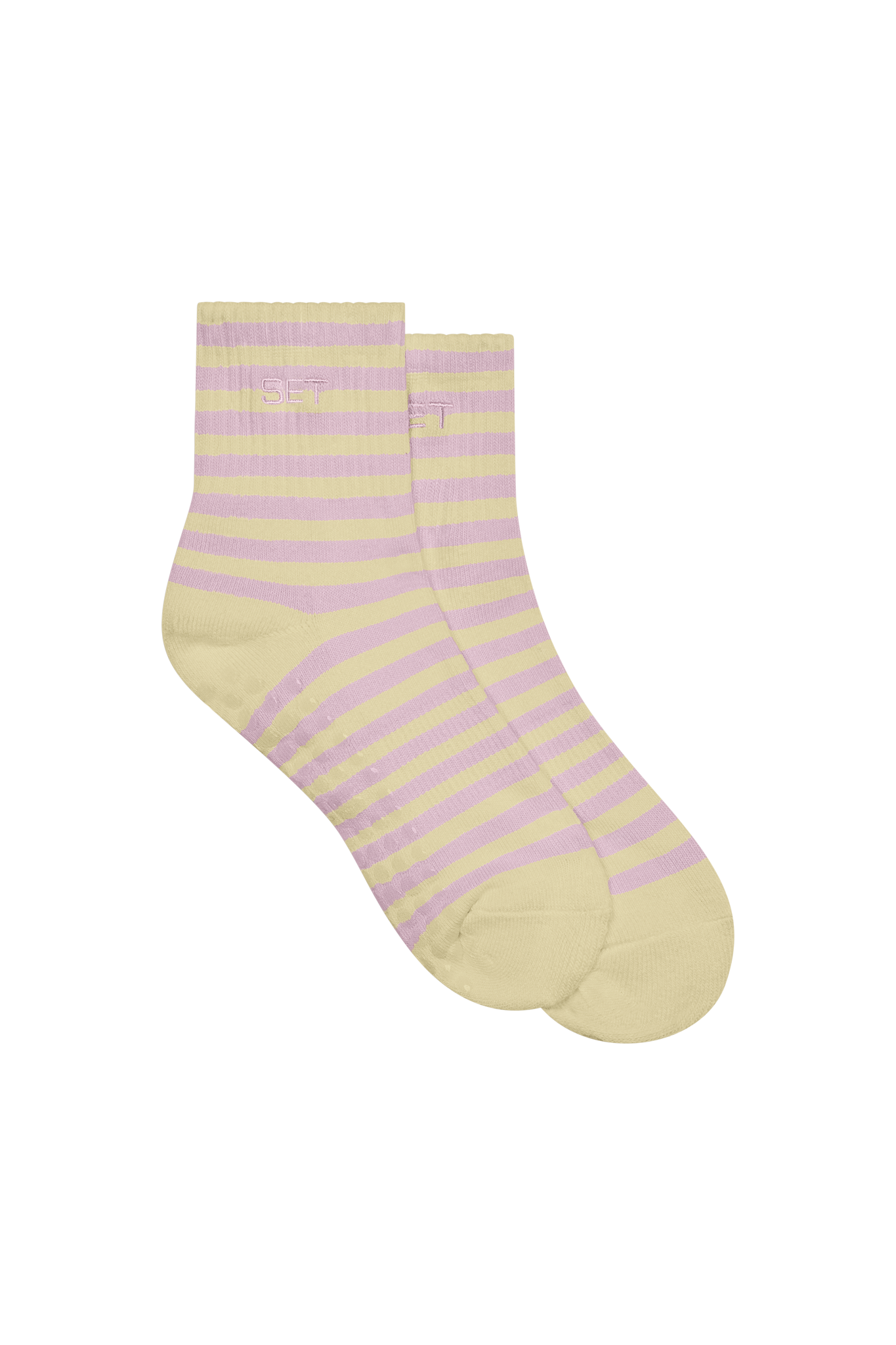 Pair of yellow and pink striped socks on a white background