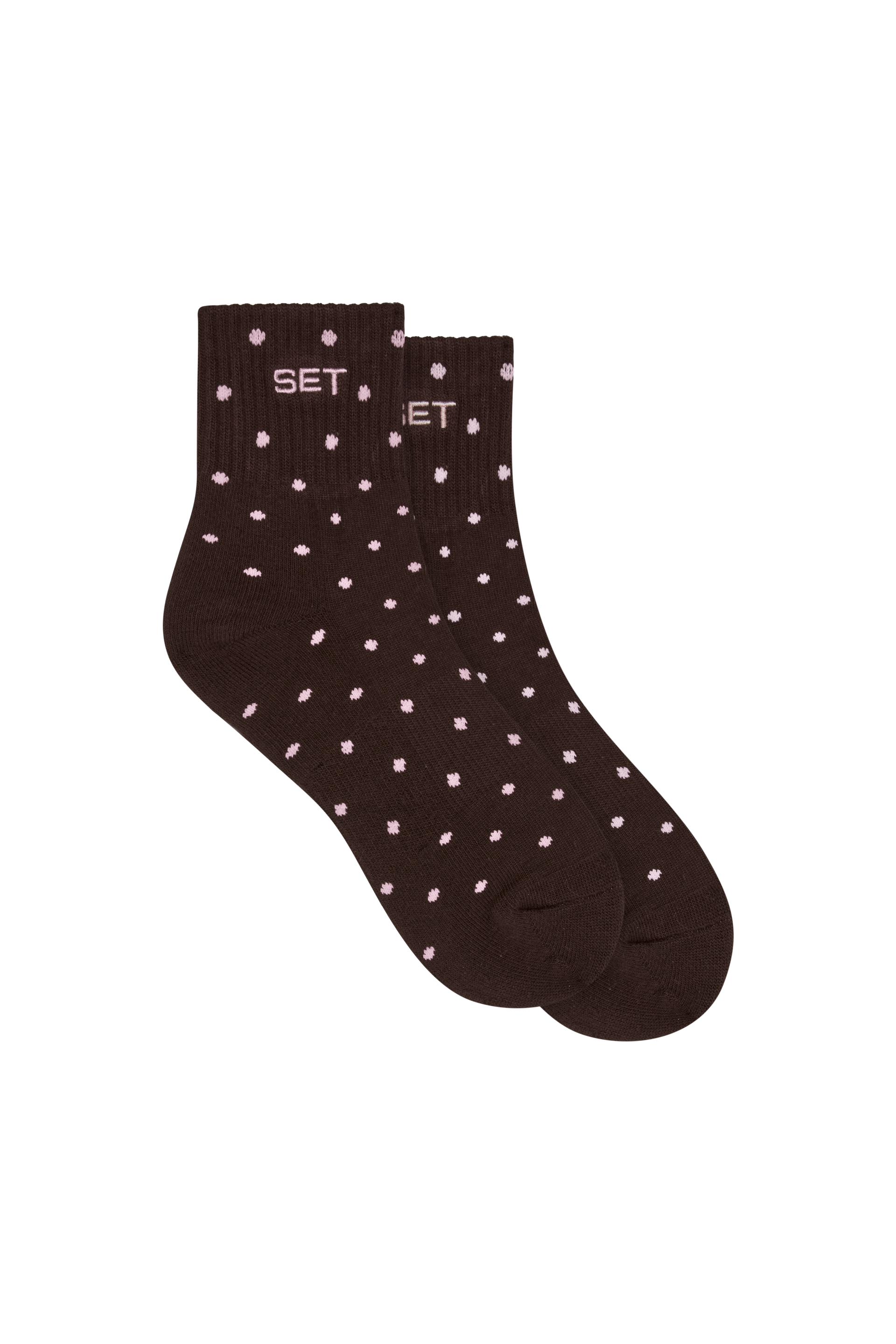 Brown sock with white polka dots on a white background
