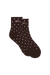 Brown sock with white polka dots on a white background