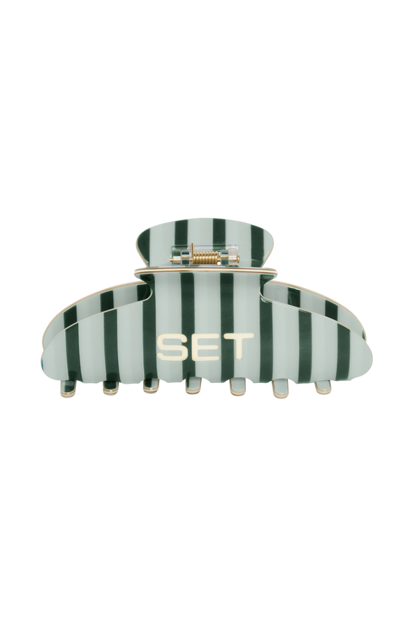 Striped hair clip with 'SET' branding on a white background
