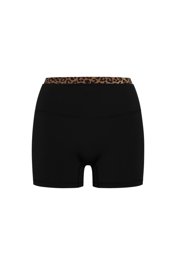 Black athletic shorts with a leopard print waistband, shown from the back on a plain white background.