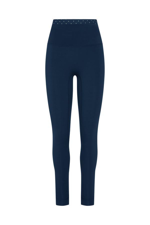 Navy blue leggings with a subtle pattern on a white background