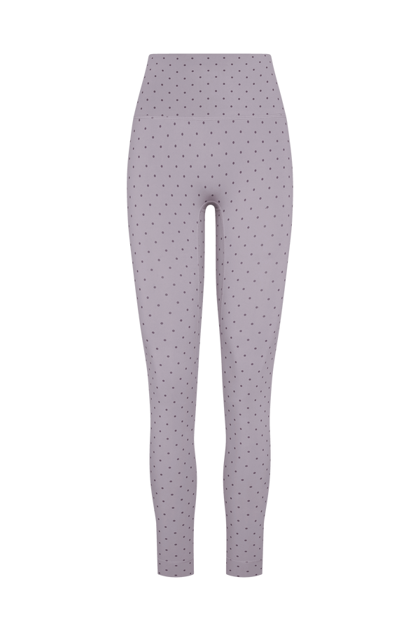 High-waisted leggings in a dusty lavender-purple color with a small black polka dot pattern, shown against a plain white background.