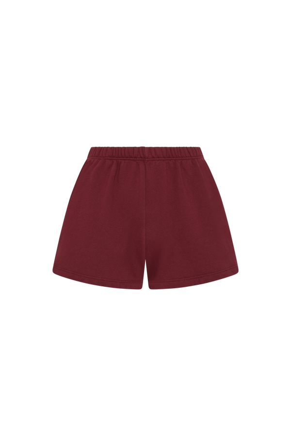 Maroon shorts on a white background