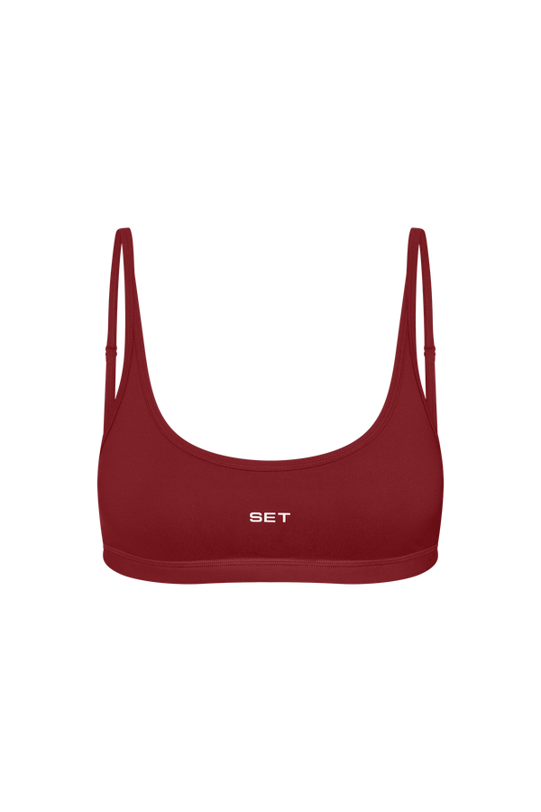 Red bralette with 'SET' logo on a white background