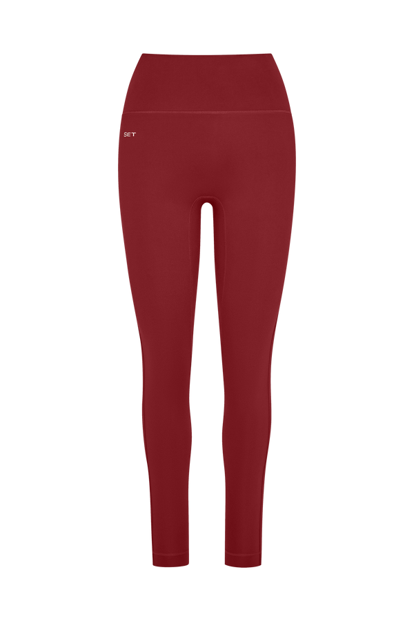 Red leggings on a white background