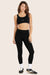 MODEL WEARS SCULPTFLEX® LEGGINGS IN ONYX 