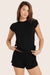 Woman modeling a onyx Set™ Sleep Jersey Girlfriend Tee shirt