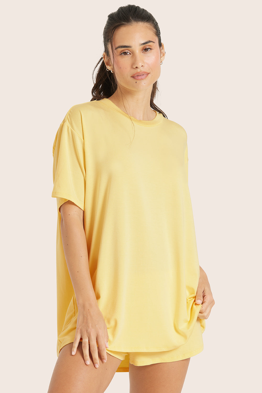 MODEL WEARS SLEEP JERSEY OVERSIZED BOYFRIEND SLEEP TEE IN DANDELION