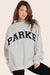 MODEL WEARS SET X PARKE REVERSIBLE VARSITY MOCKNECK IN PARKE HEATHER GREY <model-info>Gabbie wears a size XL and is 5’6", 26" waist, 34" bust, 34B bra.</model-info>