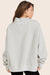 MODEL WEARS SET X PARKE REVERSIBLE VARSITY MOCKNECK IN PARKE HEATHER GREY 