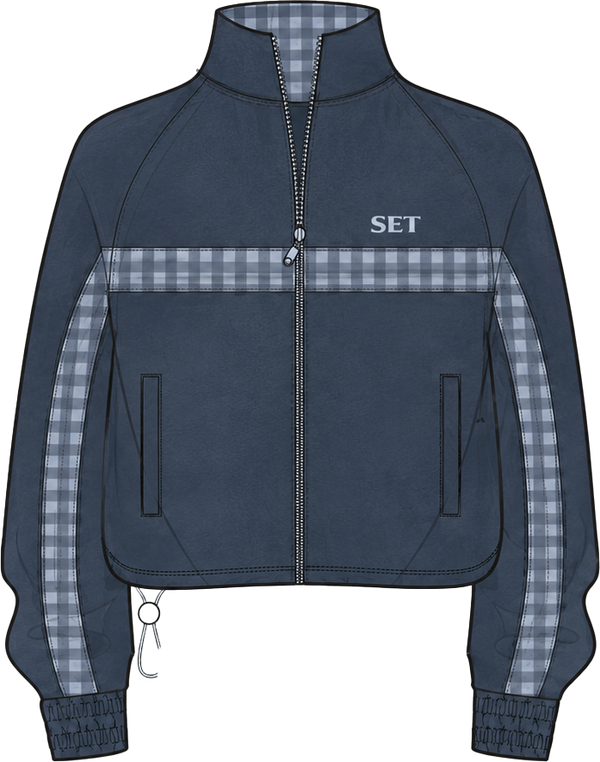 A navy blue zip-up track jacket with a high collar, featuring a light gray and white gingham pattern stripe across the chest and down the sleeves, with the letters 'SET' embroidered in white on the left chest.