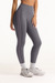 Person wearing gray leggings with white stripes on a white background <model-info>Sophie wears a size S and is 5’9½”, 23” waist, 34CD bust.</model-info>