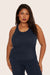SET™ CLASSIC COTTON DAILY RACER TANK IN OXFORD <model-info>Kaffya wears a size L and is 5’7", 35" waist, 40" bust, 36DDD bra.</model-info>