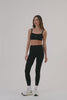 MODEL WEARS SET™ SPORTBODY® LEGGINGS IN ONYX