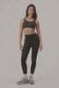 MODEL WEARS SCULPTFLEX® POWER HIGH-RISE LEGGINGS IN ESPRESSO