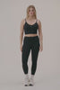 MODEL WEARS FORMCLOUD® CLOUD MID-RISE LEGGINGS IN ONYX